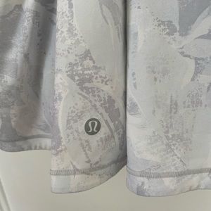 Size 4 or small, white tennis skirt with shorts.